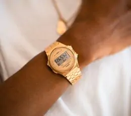 A CASIO VINTAGE UNISEX ROUND BRACELET IN GOLD