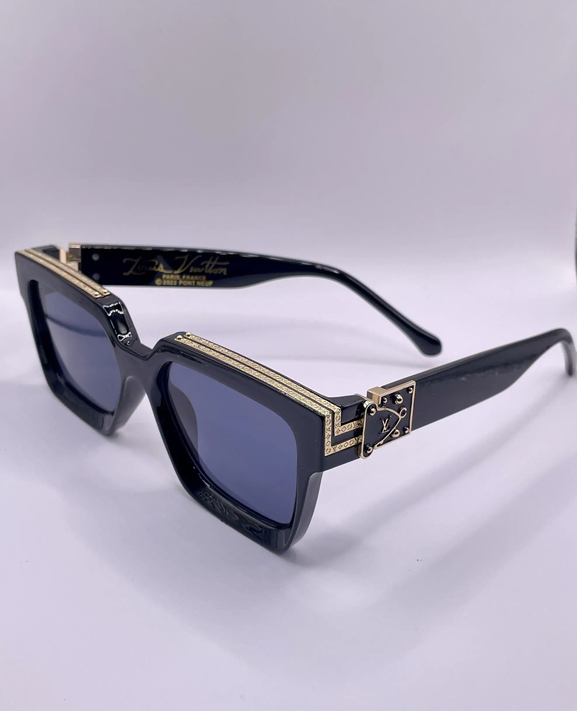 Louis Vuitton Black Gold Sunglasses - Image 1