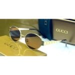 Gucci Oval Gold Metal Frame Brown Lens Sunglasses