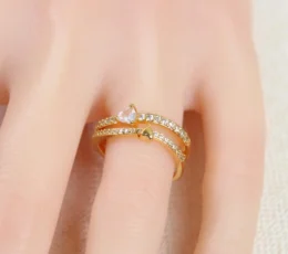  Gold alternative ring decorated with a heart and a diamond
