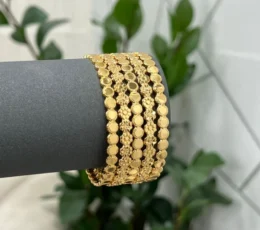 Rose bangles with a gold drill