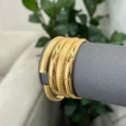 4 plain bangles with a gold-plated key