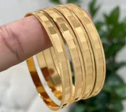 4 Rolex bangles, gold alternative
