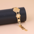 Gold alternative bracelet with oriental touches