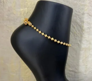 Gold Alternative Anklet With Cascading Beads And A Soft Bell