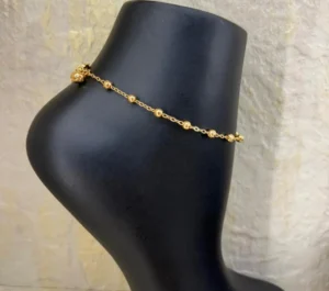 Gold Alternative Anklet With Chain Beads And A Soft Bell