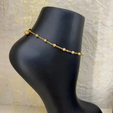 Gold Alternative Anklet With Chain Beads And A Soft Bell