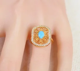 Gold alternative ring with turquoise stone