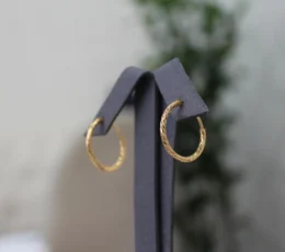 Smooth gold twisted earring