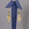 Gold Alternative Earrings With A Leaf Design