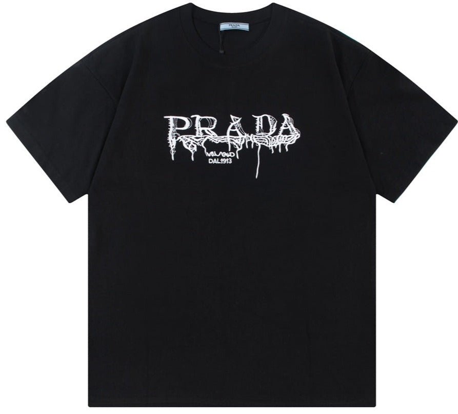1e43d727230ab504d2950eba55cf117a.jpeg Prada T-shirt - Image 1