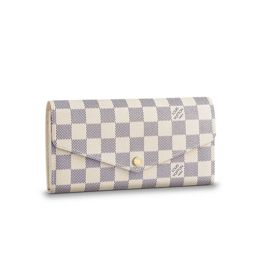 86c85a2f13f9848fe7b3e1f03aecef14.jpeg Louis Vuitton Sarah Wallet - Image 1
