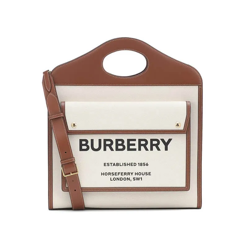 8e0fc58ac32c2f1e3681f0d365e30278.webp Pocket Medium leather-trimmed canvas tote - Image 1