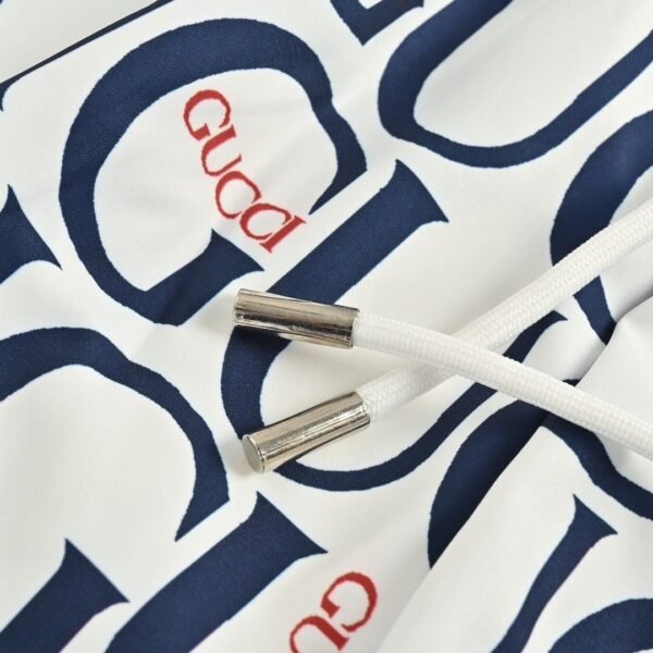 Gucci All-Over Logo Print White and Navy Drawstring Swim Shorts - Image 7