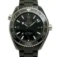 Omega Black Planet Ocean luxury watch with black dial and bracelet.