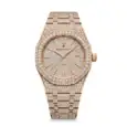 Rose gold diamond watch with a fully encrusted face and bracelet, luxury timepiece for women.