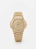 Luxury gold diamond Nautilus watch with diamond-studded dial and bracelet.