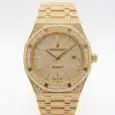 Gold diamond luxury watch with date display and automatic movement.