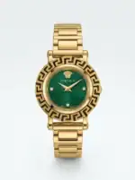 Luxury watch with gold band and green dial, Versace logo and Greek key bezel.