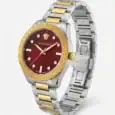 Luxury Versace watch with red dial, gold and silver band, Greek key bezel.