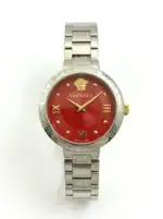 Versace luxury watch with red dial and silver band, gold accents.