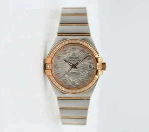 Luxury Omega Constellation watch with diamond-studded bezel and feather-patterned dial.