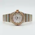 Luxury Omega Constellation watch with mother-of-pearl dial and diamond accents.