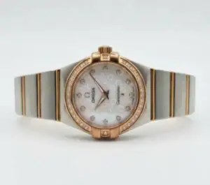 Luxury Omega Constellation watch with mother-of-pearl dial and diamond accents.