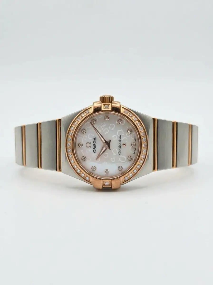 Omega Constellation Rose Gold Watch Luxury Omega Constellation watch with mother-of-pearl dial and diamond accents.
