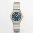 Luxury Omega Constellation watch with blue dial, diamond accents, and two-tone bracelet.