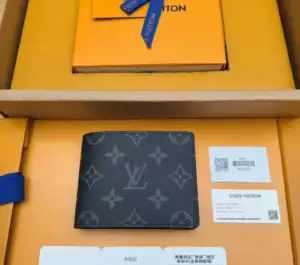Louis Vuitton Eclipse Monogram men's wallet in black with gray logo pattern.
