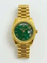 Luxury gold Rolex Day-Date watch with green dial and Roman numerals.