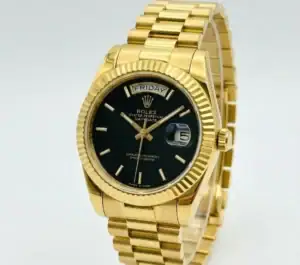 Luxury gold Rolex Day-Date watch with black dial and day-date display.