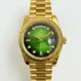Luxury gold Rolex Day-Date watch with green dial and diamond hour markers.
