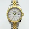 Rolex Datejust watch with white dial and two-tone band, close-up view.