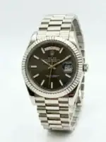 Rolex Day-Date silver stainless steel watch with black dial and date display.