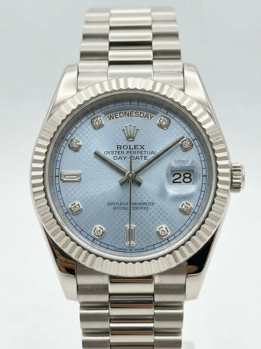 Rolex Day-Date Ice Blue Watch Rolex Day-Date watch with ice blue dial and diamond hour markers.