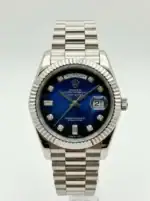 Rolex Day-Date watch with blue dial and diamond hour markers.