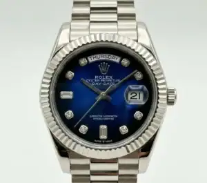 Rolex Day-Date watch with blue dial and diamond hour markers.