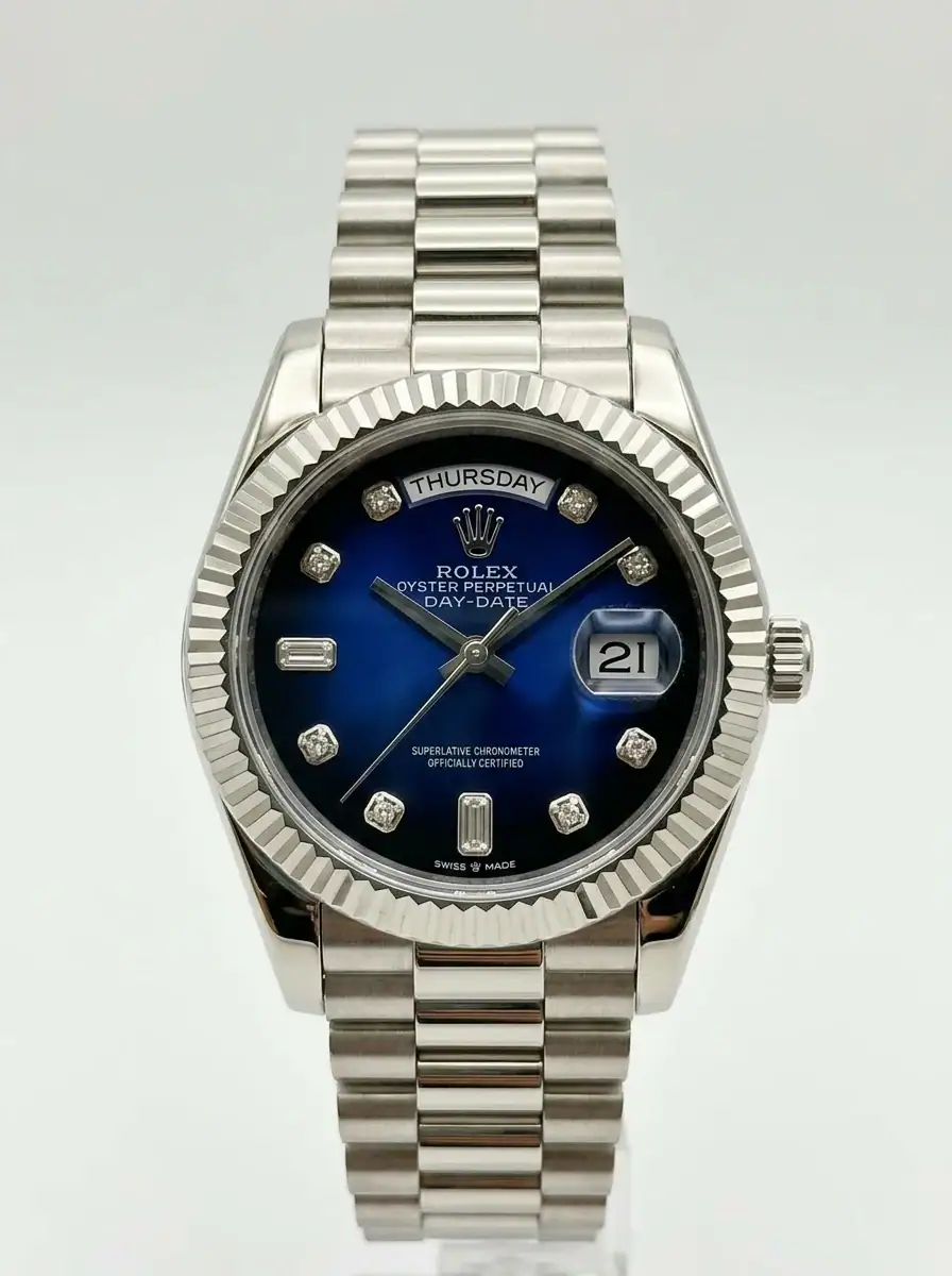 Rolex Day-Date Blue Diamond Watch Rolex Day-Date watch with blue dial and diamond hour markers.