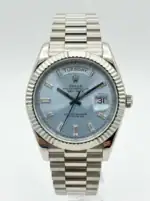 Rolex Day-Date watch with ice blue dial and diamond hour markers.
