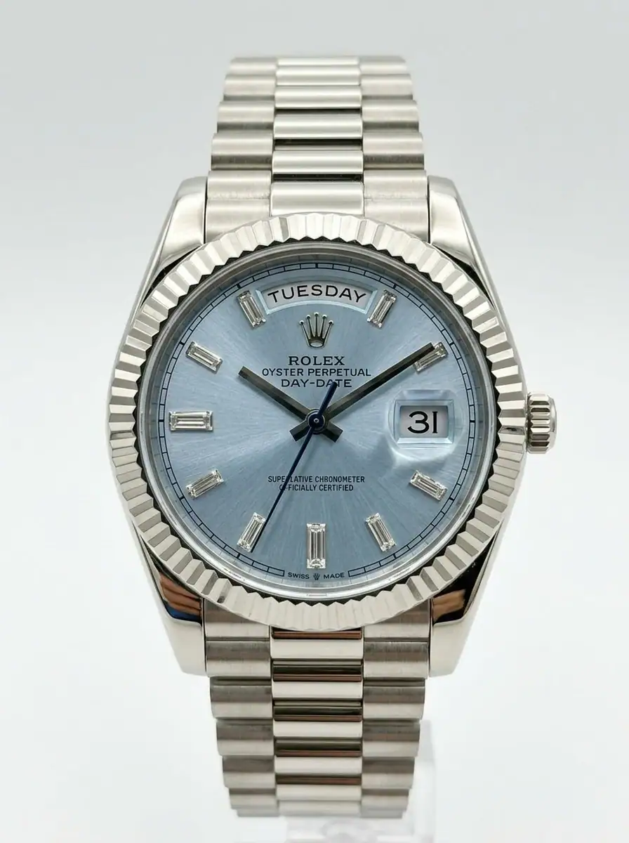 Rolex Day-Date Baguette Ice Blue Watch Rolex Day-Date watch with ice blue dial and diamond hour markers.