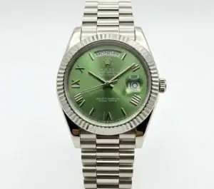 Rolex Day-Date watch with green dial, Roman numerals, and stainless steel band.