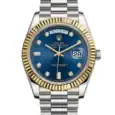 Luxury Rolex watch with blue dial, diamond hour markers, and two-tone gold and silver design.