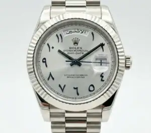 Rolex Day-Date watch with Arabic numerals and steel bracelet.
