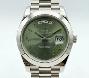 Rolex Day-Date watch with green dial and Arabic numerals in steel.