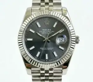Rolex Datejust with rhodium dial, silver bracelet, and date display.