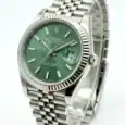 Rolex Datejust with green dial, stainless steel band, and date window.