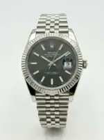 Rolex Datejust with black dial, silver bracelet, date display, fluted bezel.
