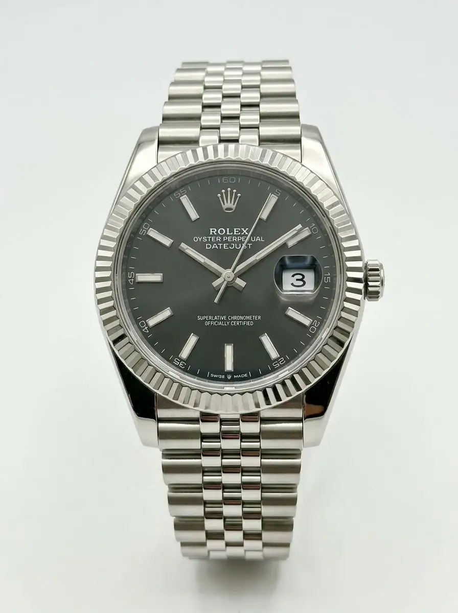 Rolex Datejust Black Dial Watch Rolex Datejust with black dial, silver bracelet, date display, fluted bezel.